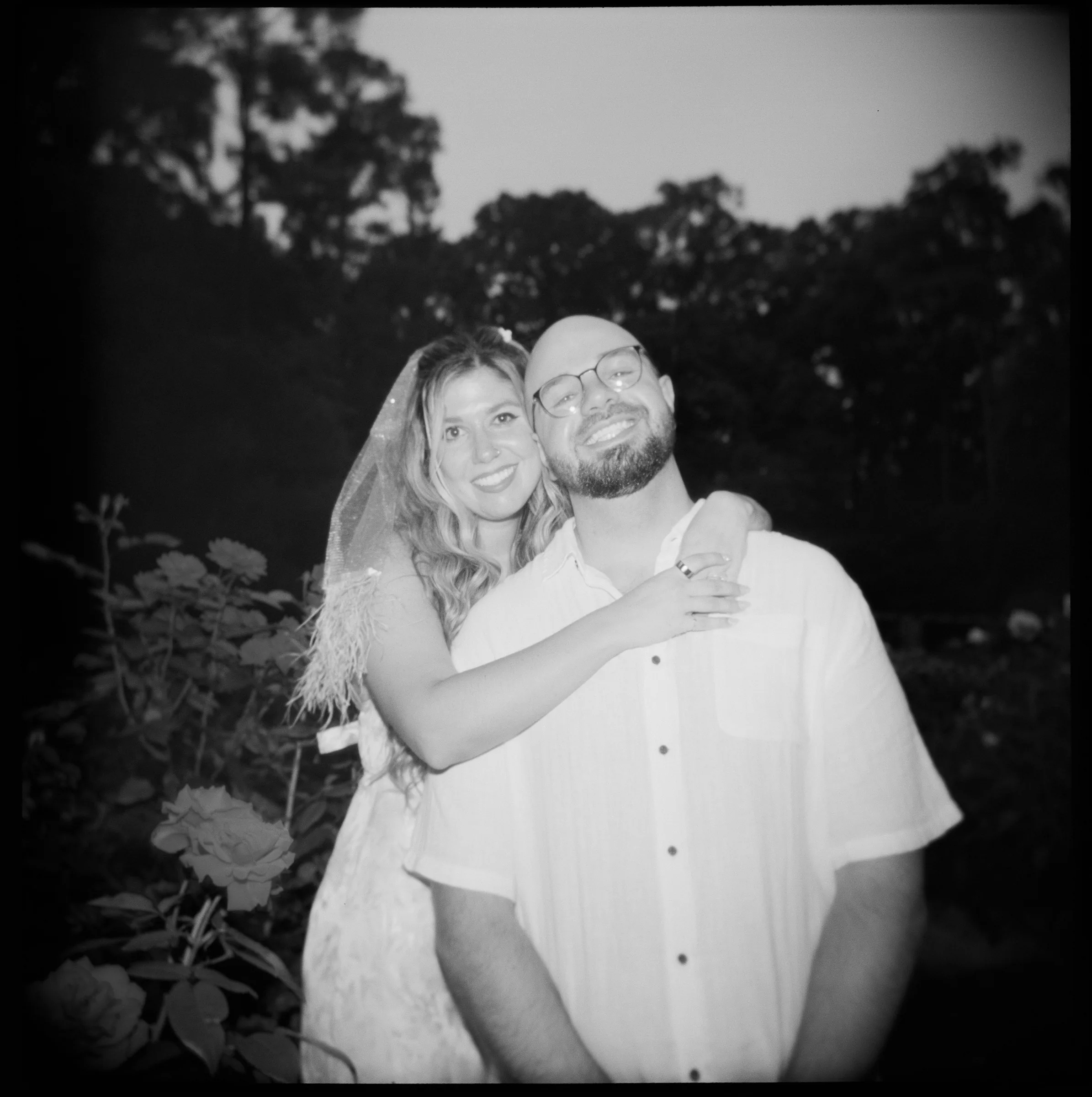 Nicole and Ian at dusk, in black and white